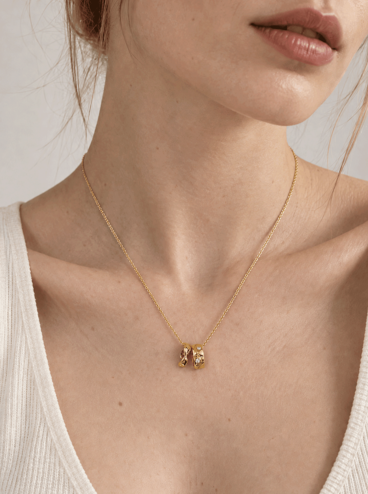 TIDAL RIPPLE DOUBLE RING NECKLACE